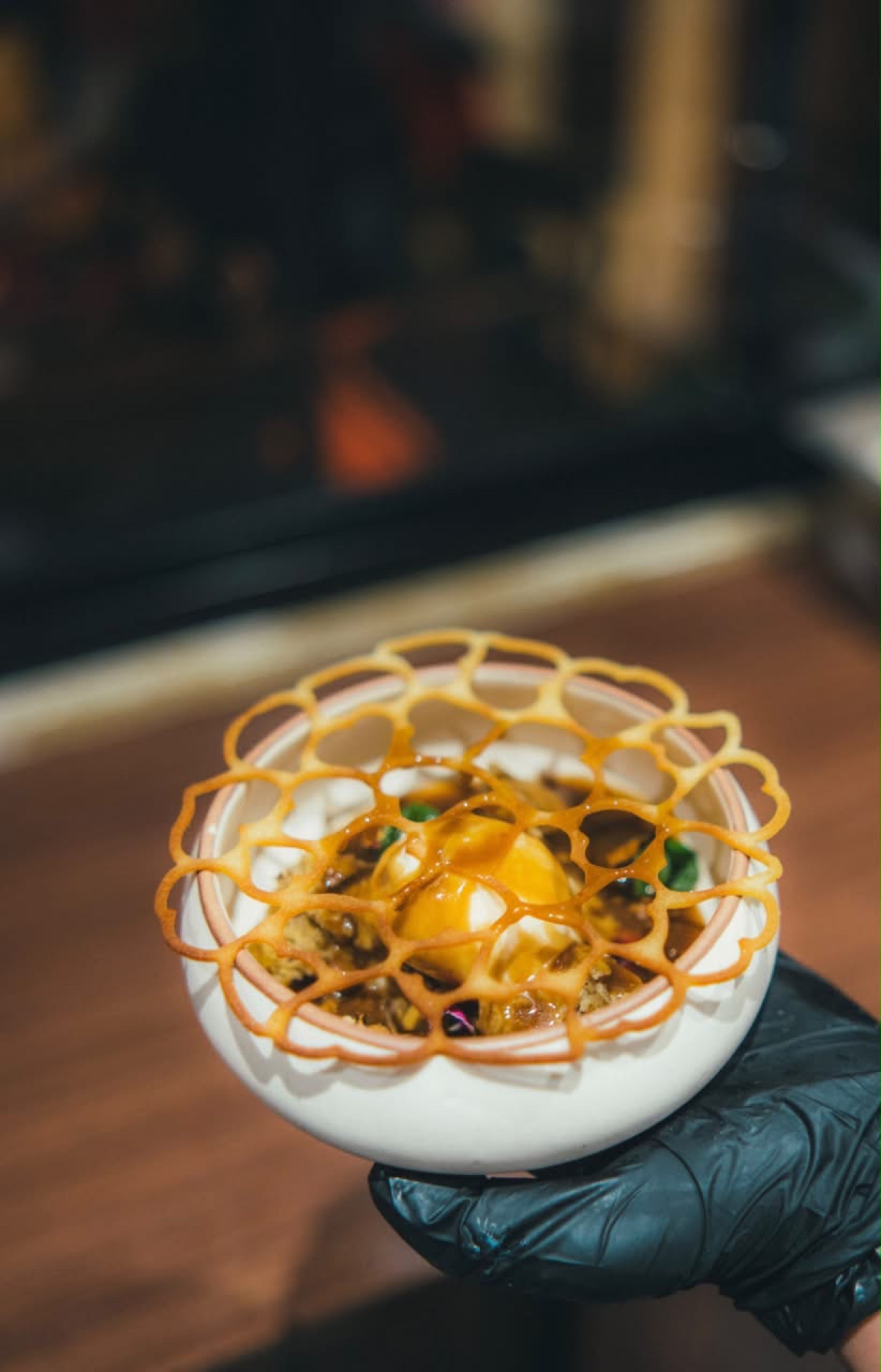 Pastry & Dessert Architecture: Layered honey tuile and delicate custard composition